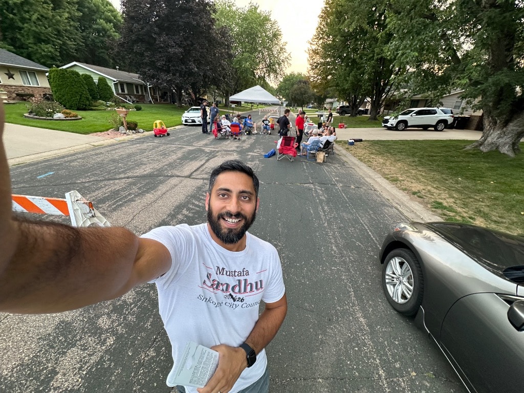 Man selfie at a neighborhood street gathering