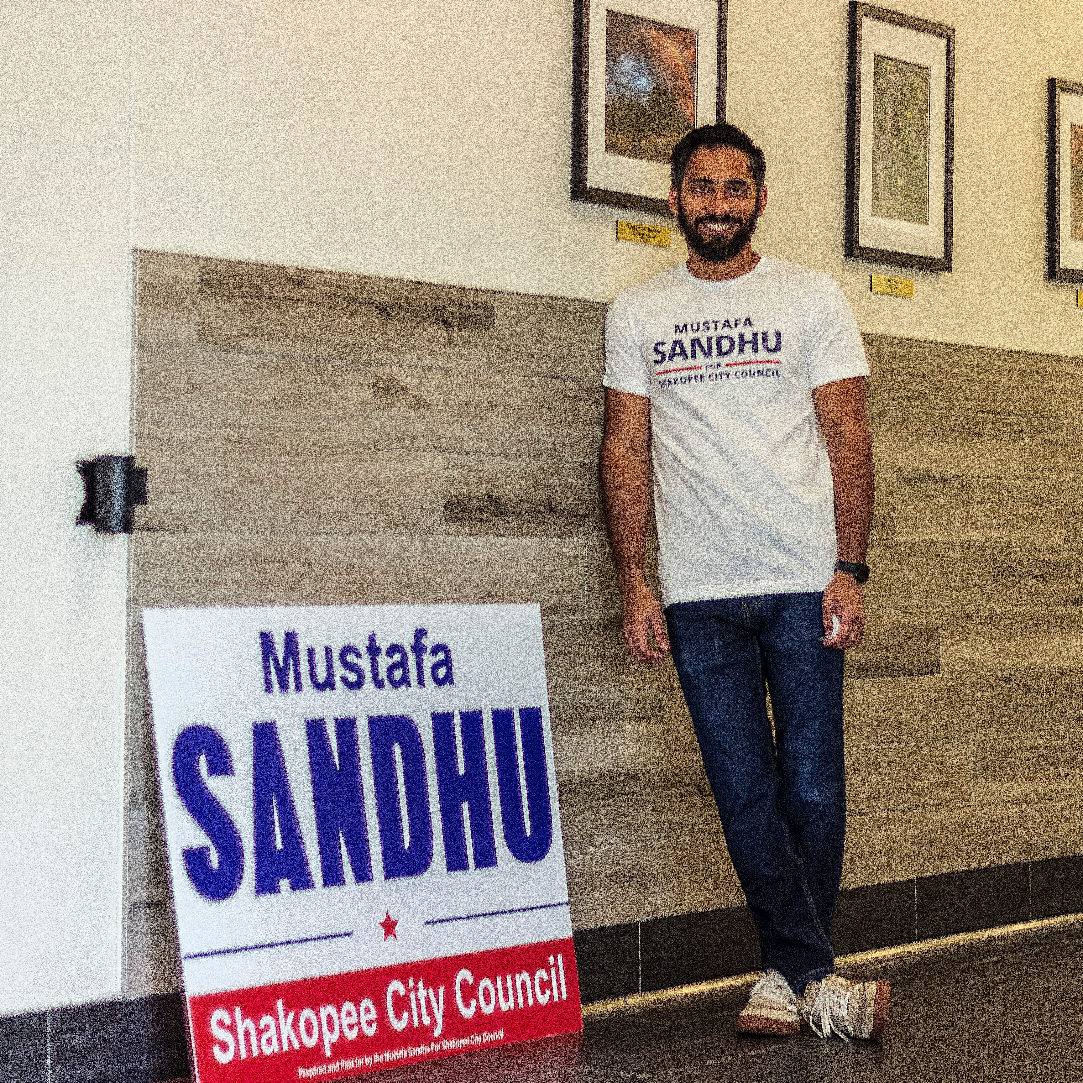 Mustafa Sandhu in one-on-one conversation with supporter at meet and greet